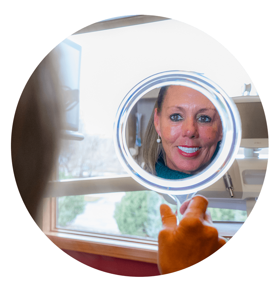 patient smiling after their dental procedure