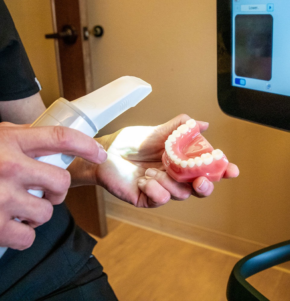 close up of model arch being demo with the dental center technology